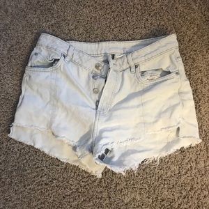 White high waisted denim shorts.